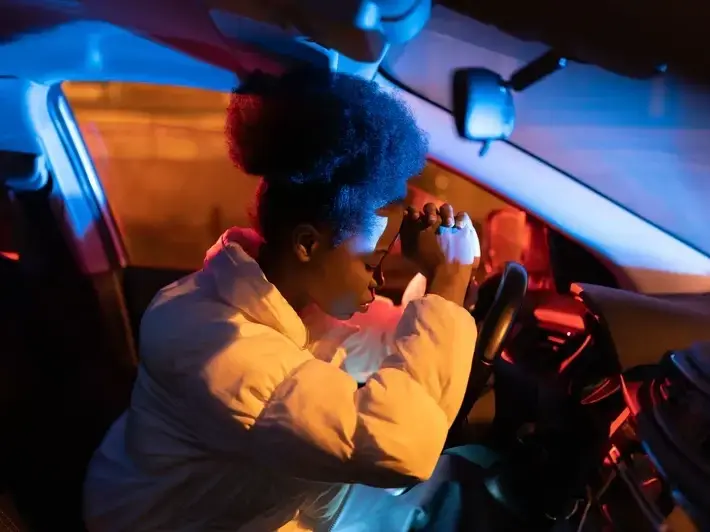 Tempe DUI victim injury lawyer reviewing crash evidence near Mill Avenue District at night